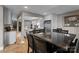 Dining area with a large table, chairs, and a view into the kitchen at 5075 Lakeview Cir, Sherrills Ford, NC 28673