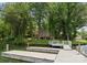 Exterior waterfront view of a two-story home with private boat dock and lakeside enjoyment at 5075 Lakeview Cir, Sherrills Ford, NC 28673