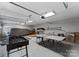 Spacious garage with table tennis, foosball table, and storage space at 5075 Lakeview Cir, Sherrills Ford, NC 28673