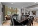 Open-concept living room with high ceilings, large windows, and a stone fireplace feature at 5075 Lakeview Cir, Sherrills Ford, NC 28673