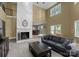 Vaulted ceilings and bright living room with stone fireplace and easy access to the dining area at 5075 Lakeview Cir, Sherrills Ford, NC 28673