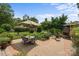 Spacious brick patio features an umbrella-covered dining table and outdoor grill, perfect for entertaining in a serene backyard setting at 603 S Fulton St, Salisbury, NC 28144
