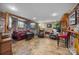 Finished basement with exposed brick, a wet bar, and comfortable seating area at 603 S Fulton St, Salisbury, NC 28144