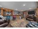 Finished basement featuring a wet bar, exposed brick, and entertainment area at 603 S Fulton St, Salisbury, NC 28144