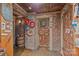Rustic basement with brick walls, a dartboard, and decorative beer signs at 603 S Fulton St, Salisbury, NC 28144