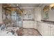 Elegant bathroom with a glass enclosed shower and vanity with double sinks at 603 S Fulton St, Salisbury, NC 28144