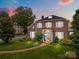 Beautiful brick two-story home with manicured lawn, mature trees, and a welcoming brick walkway at 603 S Fulton St, Salisbury, NC 28144
