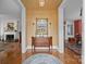Elegant foyer featuring hardwood floors, a decorative mirror, and ornate light fixtures at 603 S Fulton St, Salisbury, NC 28144