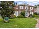 Inviting two-story brick home with a well-maintained lawn, showcasing its classic architecture and attractive landscaping at 603 S Fulton St, Salisbury, NC 28144