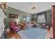Cozy living room with comfortable seating, a patterned rug, and natural light at 603 S Fulton St, Salisbury, NC 28144