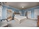 Main bedroom featuring a luxurious ensuite bathroom and ample natural light at 603 S Fulton St, Salisbury, NC 28144