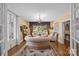 Bright sitting area with large windows, hardwood floors, and elegant decor at 603 S Fulton St, Salisbury, NC 28144