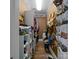 Organized walk-in closet features shelving and hanging storage, maximizing space for clothes and accessories at 603 S Fulton St, Salisbury, NC 28144