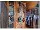 Wood paneled walk-in closet with custom organization solutions, perfect for wardrobe storage at 603 S Fulton St, Salisbury, NC 28144
