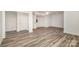 Spacious finished basement featuring neutral walls and floors at 6823 Manatee Dr, Concord, NC 28025