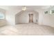 Large bonus room or loft with carpet, vaulted ceilings, and lots of light at 6823 Manatee Dr, Concord, NC 28025