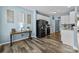 Kitchen area with stainless steel appliances, wood floors and table at 6908 Beamish Pl, Mint Hill, NC 28227
