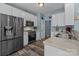 Kitchen with stainless steel appliances, and white cabinets at 6908 Beamish Pl, Mint Hill, NC 28227