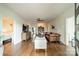 Inviting living room with hardwood floors, stylish decor, and ample natural light, creates a cozy atmosphere at 7901 Bud Henderson Rd, Huntersville, NC 28078