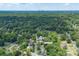 Aerial view of property with Uptown Charlotte shown in the background at 8019 Walnut Creek Ln, Charlotte, NC 28227