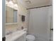 Standard bathroom with a vanity, toilet, bathtub, and shower with neutral tones at 8019 Walnut Creek Ln, Charlotte, NC 28227