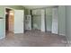 Bedroom with view to bathroom. Hardwood floors and view of closet at 8019 Walnut Creek Ln, Charlotte, NC 28227