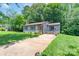 Charming single-story home with a cozy front porch and a well-maintained lawn at 8019 Walnut Creek Ln, Charlotte, NC 28227