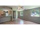 Bright living room featuring windows and an open floor plan at 8019 Walnut Creek Ln, Charlotte, NC 28227