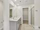 Bathroom featuring double vanity sinks, granite countertops, and a glass enclosed shower at 908 Smithcliffs Trl, York, SC 29745