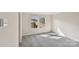 Bright bedroom with neutral walls, carpet flooring, and large windows offering plenty of natural light at 908 Smithcliffs Trl, York, SC 29745