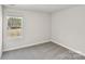 Bedroom featuring neutral paint, carpet flooring, and a bright window at 908 Smithcliffs Trl, York, SC 29745