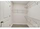 Walk-in closet with carpeted floor and wire shelving for ample storage at 908 Smithcliffs Trl, York, SC 29745