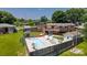 A backyard with pool, gazebo, deck and storage shed at 920 Thomas St, Statesville, NC 28677