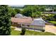 Aerial view of home showing the backyard, neighboring properties, and swimming pool at 920 Thomas St, Statesville, NC 28677