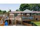Inviting elevated back deck featuring a charming gazebo and ample space for relaxing and entertaining outdoors at 920 Thomas St, Statesville, NC 28677