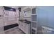 Renovated bathroom with black and white patterned floor and modern vanity at 920 Thomas St, Statesville, NC 28677
