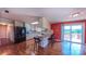 Spacious eat-in kitchen featuring white cabinetry, granite countertops, and stainless steel appliances at 920 Thomas St, Statesville, NC 28677