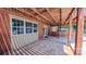Covered patio area perfect for outdoor dining and relaxation with access to the backyard at 920 Thomas St, Statesville, NC 28677