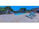 Sparkling swimming pool with a slide and lounge chairs, perfect for relaxing on sunny days at 920 Thomas St, Statesville, NC 28677