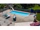 Backyard pool with lounge seating and slide at 920 Thomas St, Statesville, NC 28677