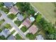 Aerial view of a property featuring a pool in a fenced in backyard, mature trees, and neighborhood setting at 1003 Grayscroft Dr, Waxhaw, NC 28173