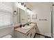 Bathroom featuring double sinks, granite countertops, and updated fixtures at 1003 Grayscroft Dr, Waxhaw, NC 28173