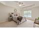 Bedroom with plush carpet, ceiling fan, and a view of the outdoor pool at 1003 Grayscroft Dr, Waxhaw, NC 28173