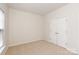 Bedroom with plush carpet, closet with double doors and natural light at 1003 Grayscroft Dr, Waxhaw, NC 28173