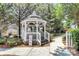 A beautiful gazebo surrounded by lush greenery and a paved walkway at 10032 Pergola View Ct, Charlotte, NC 28213