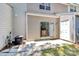 Back patio features an AC unit, sliding glass door, and exterior door at 10032 Pergola View Ct, Charlotte, NC 28213