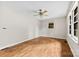 Bright bedroom with hardwood floors, ceiling fan, and natural light from a large window at 1156 Westover Cir, Rock Hill, SC 29732