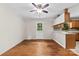 A dining room featuring hardwood floors, a ceiling fan, and a door with glass panes to the backyard at 1156 Westover Cir, Rock Hill, SC 29732
