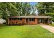 Charming brick home with a well-maintained lawn and a convenient carport at 1156 Westover Cir, Rock Hill, SC 29732