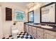 Bright bathroom with dual mirrors and vanity at 1175 18Th Ne Ave, Hickory, NC 28601
